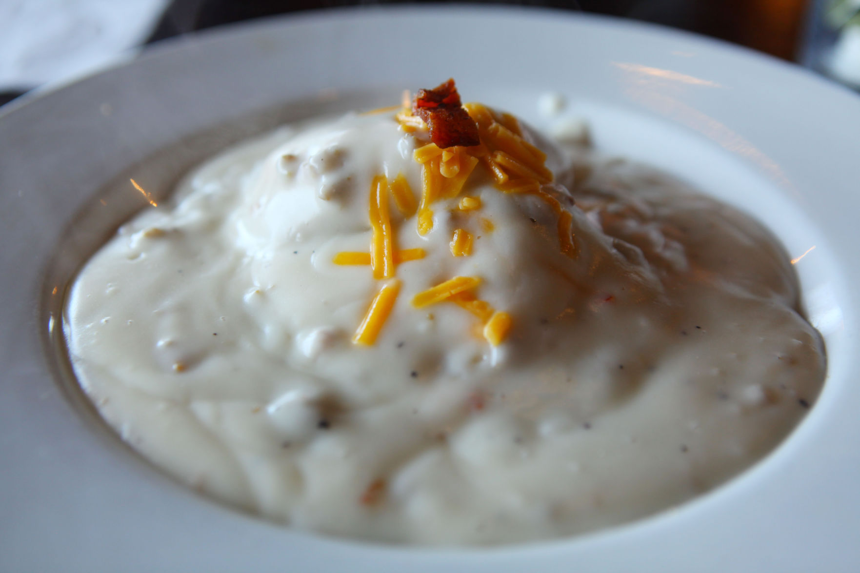 Cheddar and Bacon Stuffed Biscuits & Gravy